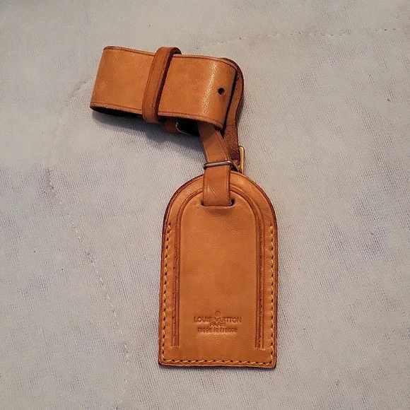 Louis Vuitton Poignant and Luggage Tag - Picture 1 of 4